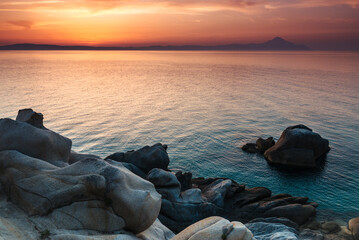 Amazing landscape of sunrise at sea. Colorful morning view of dramatic sky. Seascape. Greece. Mediterranean Sea. 
