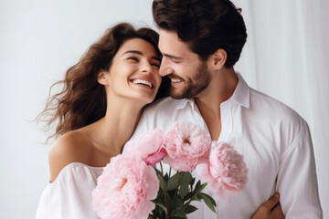beautiful young couple in love girl model with a young man with a bouquet of flowers, international women's day, warm relationship care and attention