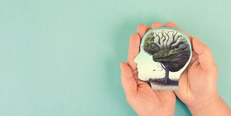 Holding human brain tree in the hands, self care and mental health concept, positive thinking, creative mind, personal growth and strength - obrazy, fototapety, plakaty
