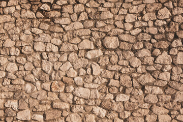 Background of stone wall texture photo. Close-up of stone wall.