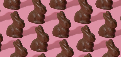 Chocolate rabbit pattern symbol to Easter holidays on a pink banner background.