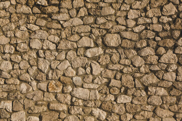 Background of stone wall texture photo. Close-up of stone wall.