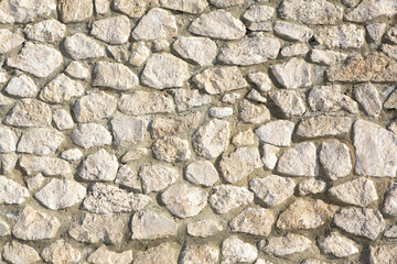 Background of stone wall texture photo. Close-up of stone wall.
