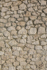 Background of stone wall texture photo. Close-up of stone wall.