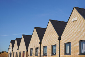 Row of residential rooftops. Housing and property 