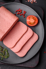 Delicious canned pink ham with salt, spices and herbs - obrazy, fototapety, plakaty