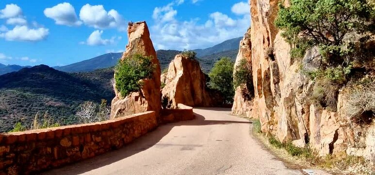 Corsica, France. Amazing red rocks of Calanques de Piana. famous route and travel destination in west coast of the island in gulf of Porto