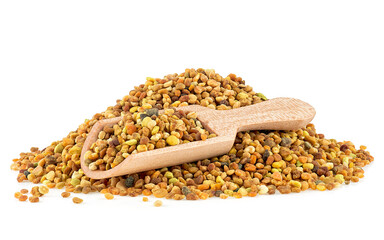 Fototapeta premium Raw organic honey bee pollen in wooden spoon isolated over white background. Bee pollen grains, bee bread.