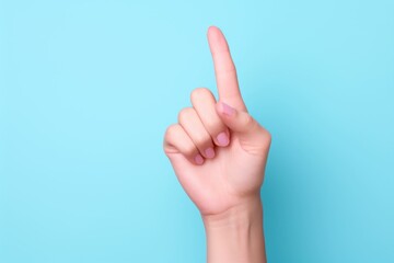 Hand gesture, solid color background