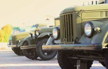 Photo of the cabins of three military off-road vehicles from the times of the Soviet Union. Side...
