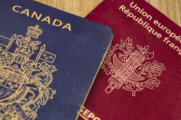 Closeup view of french and canadian passport.