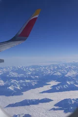 Cercles muraux Kangchenjunga View from a plane looking to the clouds