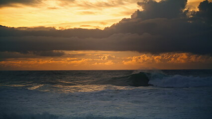Sea waves barreling shore on sunset. Breathtaking seascape nature landscape view