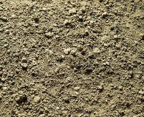 Natural background. Light soil close up