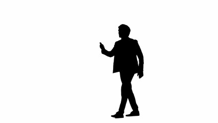 Side view male model in studio isolated on white background with alpha channel. Silhouette of businessman in suit walking and views information on a smartphone.