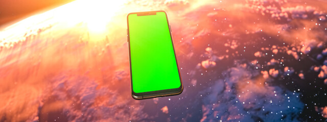 smartphone with a green screen floating in the foreground with a dramatic backdrop of the Earth's atmosphere from space, where the sun casts a warm glow on the planet.