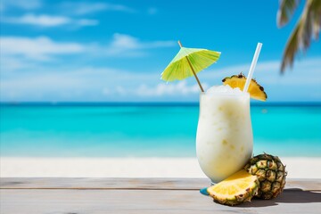 Delicious pina colada cocktail served on a beautiful tropical beach with pineapple fruits and umbrella - obrazy, fototapety, plakaty