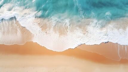 Fototapeta na wymiar Top down view of ocean waves gently rolling onto the beach