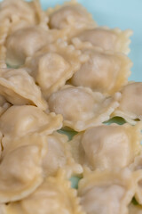 small dumplings with wheat flour and pieces of meat