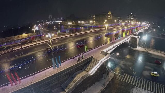 Transport drive by Bolshoy Moskvoretsky bridge with illumination