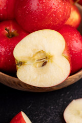 Naklejka na ściany i meble red ripe apples on the table, wet apples
