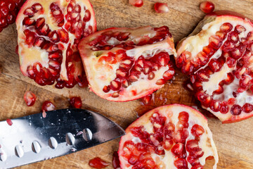 red ripe pomegranate with red grains