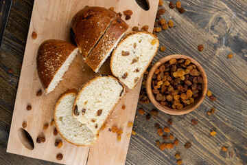 sweet bun with golden raisins, closeup