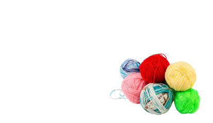 Close up shot of colored wool yarn balls as background