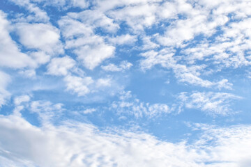Blue sky with white fluffy clouds. Cumulus sky. Freedom of life, Positive energy and New life beginning concepts. 