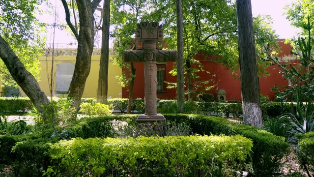 Atrium stone cross in San Agustin Churc, historic center of Tlalpan, Mexico city, Mexico.