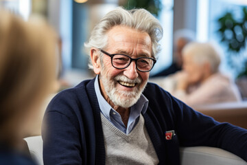 Joyful Senior Man Conversing in Retirement Home