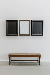 Plain wall with three canvas on the wall, ideal for mock ups