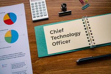 There is notebook with the word Chief Technology Officer. It is as an eye-catching image.
