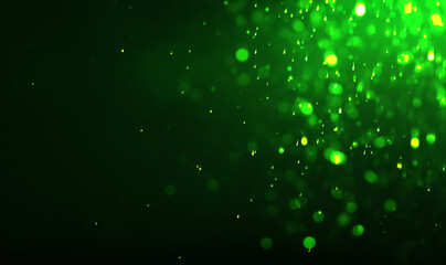 St. Patrick day. Shiny green glitter on black background, bokeh effect