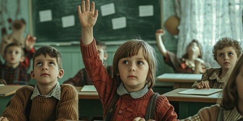 Fototapeta premium A boy in a school class, vintage style, from the 70s/80s, raises his hand to ask the teacher in front of his classmates.