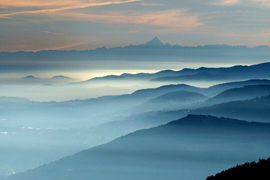 View from Pizzoni di Laveno on silhouettes of mountain ranges with Monte Viso in the distance, Lake Maggiore, Laveno, Lombardy, Italy, Europe