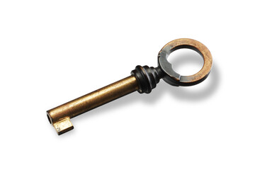 Old brass key on white with shadow