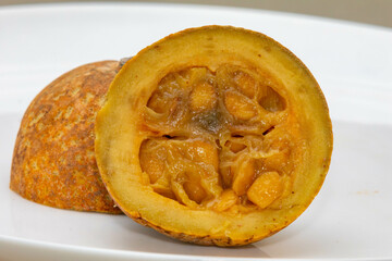 Jenipapo fruit (Genipa americana) in selective focus in details that define the characteristics of the species