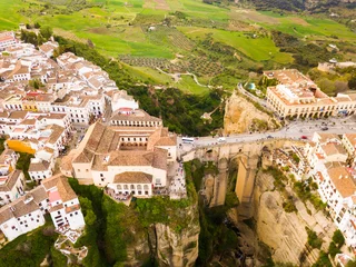 Cercles muraux Ronda Pont Neuf Aerial view of Ronda landscape and buildings with Puente Nuevo Bridge, Andalusia, Spain