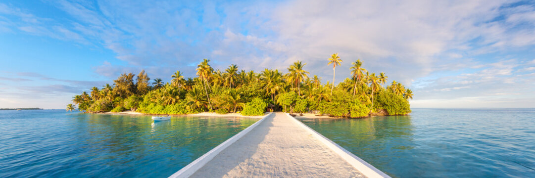 Panoramic of jetty leading to tropical island in the Maldives