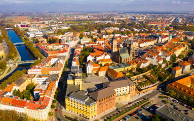 Fototapeta na wymiar Scenic view from drone of Hradec Kralove cityscape overlooking White tower and Cathedral of Holy Spirit on autumn day, Czech Republic..