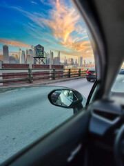 Capture the essence of motion through this dynamic image of a New York highway, with the car's...
