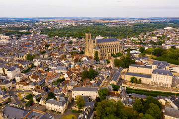 Fototapeta na wymiar Scenic aerial view of Bourges town and surroundings in summer overlooking Gothic building of Roman Catholic Cathedral, France..