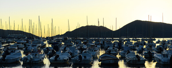 Evening view on Lerici marina and the hills on the other side of the gulf of the poets with Portovenere in La Spezia, Liguria, Italy on a summer evening at dusk - obrazy, fototapety, plakaty
