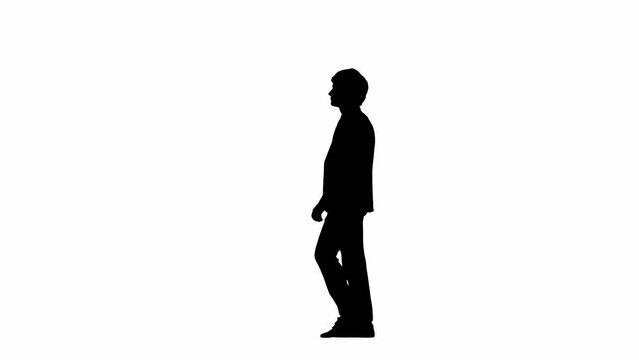 Side view male model in studio isolated on white background with alpha channel. Silhouette of businessman in suit walking.
