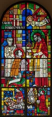 Foto op Plexiglas BERN, SWITZERLAND - JUNY 27, 2022: The St. Charles Borromeo on the stained glass in the church Dreifaltigkeitskirche by A. Schweri (1938). © Renáta Sedmáková