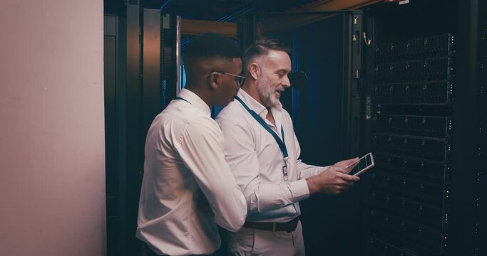 Server room, men and tablet with communication for database, information technology and pointing. Datacenter, mentor and employee with instructions to store and power computer hardware on the system