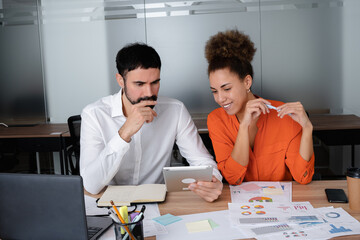 Businessman and lady in smart casual wear in the background business center