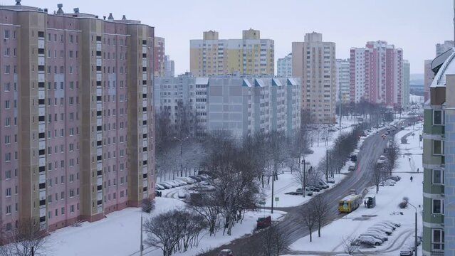 timelapse sweeping snow in the city, day turns into evening, winter