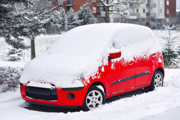 Red Car cover with a snow
